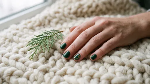 Woman's Hand With Forest Green Holiday Manicure