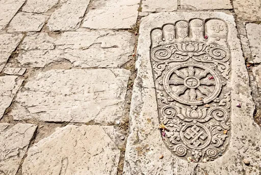 Ancient Carved Stone Buddha Footprint