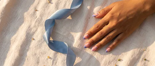 Woman Hand With Pastel French Manicure