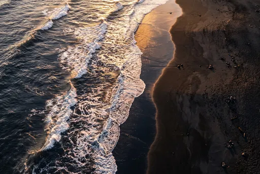 Golden Hour Waves on Black Sand Beach