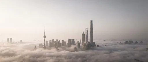 Shanghai Skyline Rising Above Morning Fog