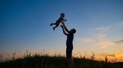 Father Tossing Toddler at Twilight