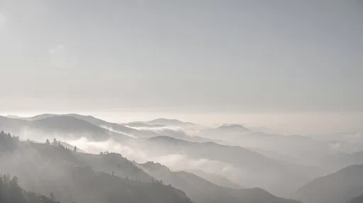 Misty Gray Mountain Ridges Wallpaper