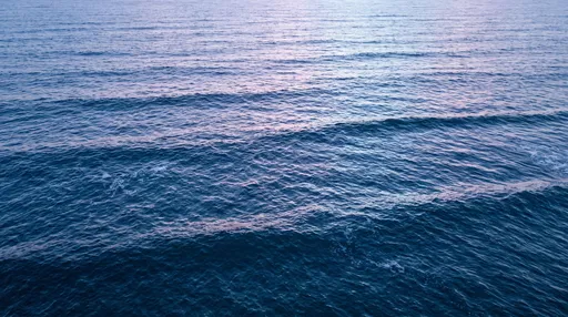 Tranquil Sapphire Ocean Swells at Dusk