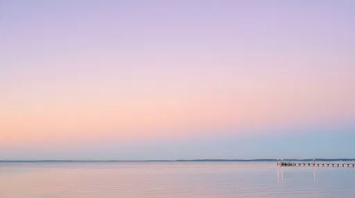 Minimalist Pastel Sunset Over Calm Bay