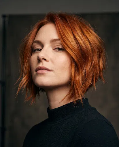 Woman With Copper Choppy Bob Haircut