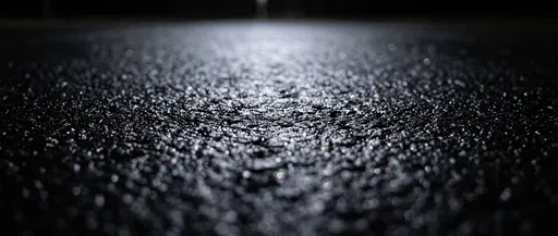 Wet Black Asphalt Macro Texture