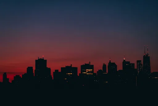 Urban Skyline Silhouette at Crimson Dusk