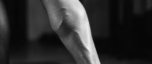 Monochrome Close-Up of Flexed Athletic Calf