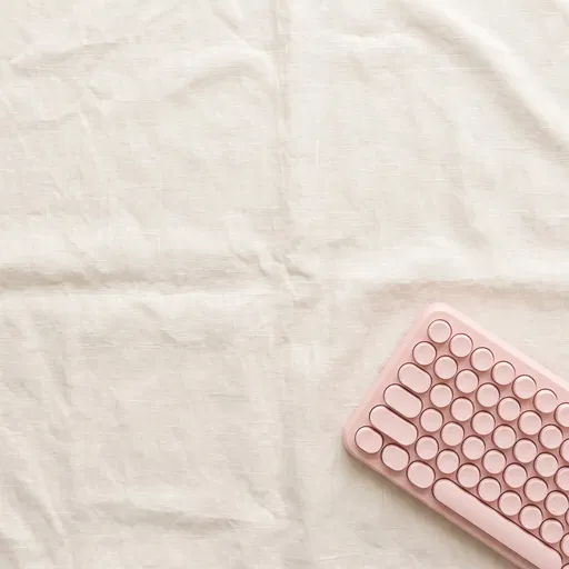 Pastel Pink Keyboard on Cream Linen