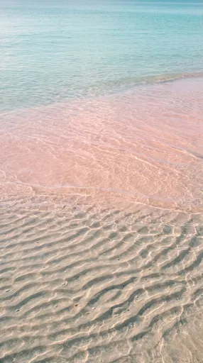 Pastel Ocean Water Over Sand Ripples