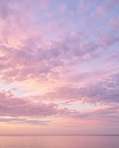 Pastel Pink Dawn Sky Over Calm Water