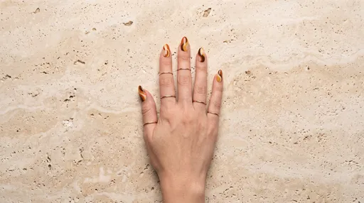 Hand With Autumn Swirl Nail Art