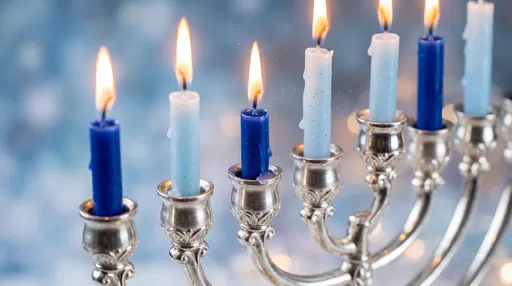 Silver Menorah With Lit Blue Candles