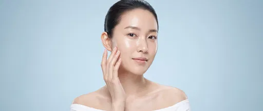 East Asian Woman With Glowing Glass Skin