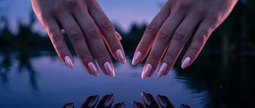 Manicured Hands With Pearl Pink Nails