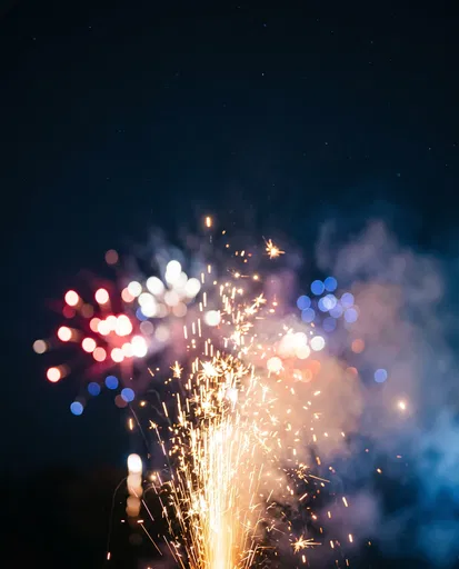 Golden Sparks and Colorful Fireworks Bokeh