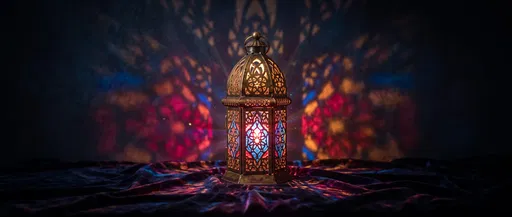 Glowing Moroccan Lantern on Dark Velvet