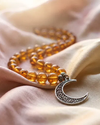 Amber Prayer Beads with Silver Crescent