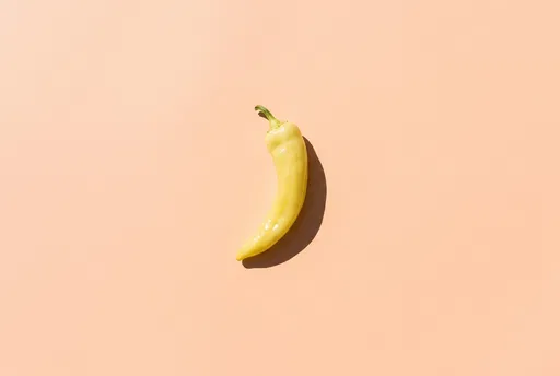 Yellow Banana Pepper on Peach Background