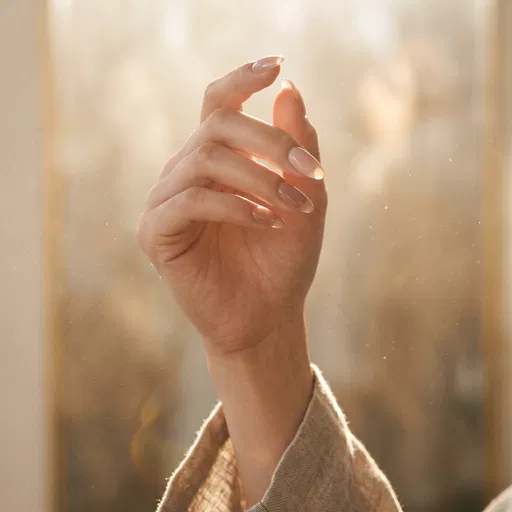 Raised Hand With Translucent Gel Manicure