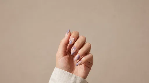 Hand With Lavender Swirl Nail Art