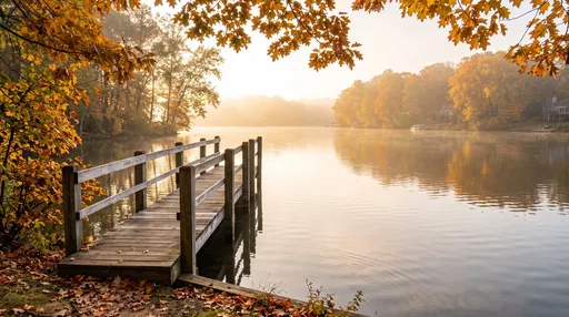 Wooden Dock on Misty Autumn Lake