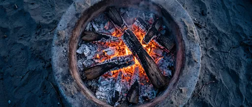 Overhead View of Glowing Beach Fire Pit