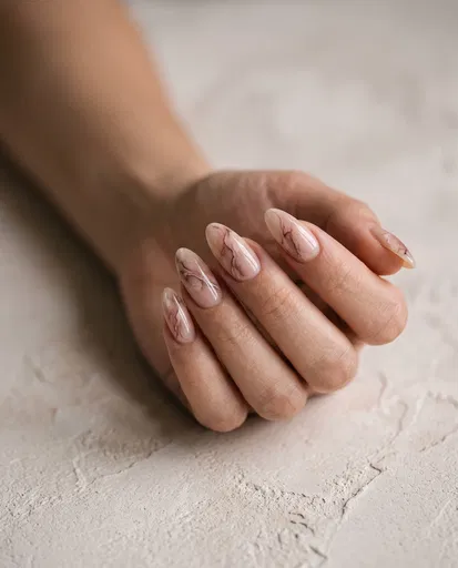 Sheer Nude Marble Almond Acrylic Nails