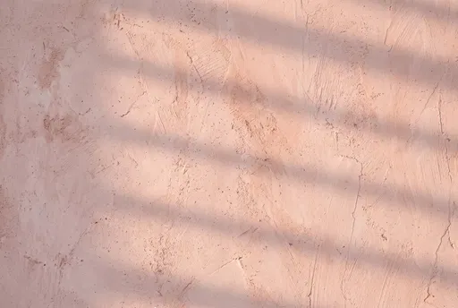 Pink Plaster Wall With Diagonal Shadows