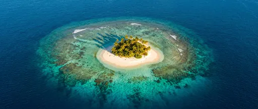 Aerial View of Tiny Tropical Island
