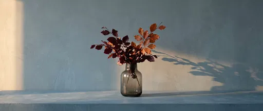 Copper Beech Branches in Smoked Glass Vase