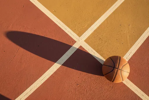 Overhead View of Basketball on Outdoor Court