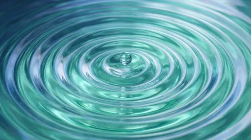 Mint Green Water Droplet and Ripples