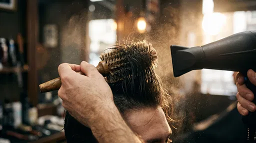 Barber Styling Hair With Dryer