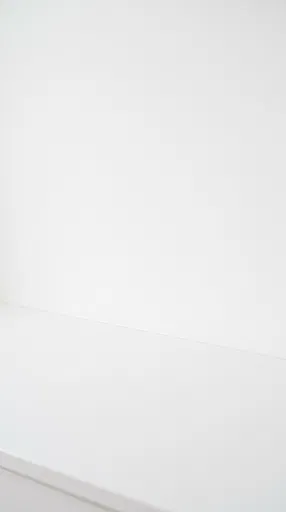 Minimalist White Counter and Wall Background