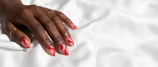Red and Pink Swirl Nail Art