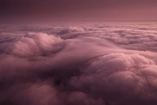 Aerial View of Pink Dusk Clouds