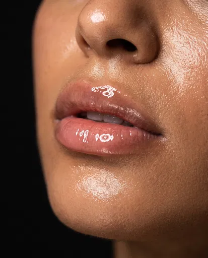 Macro Close-Up of Glossy Lips and Skin