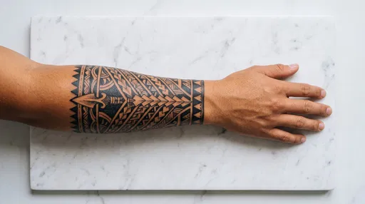 Polynesian Tribal Forearm Tattoo on Marble