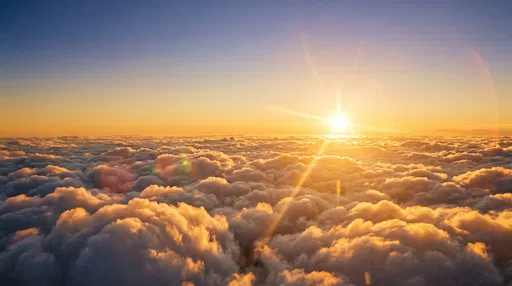 Golden Sunset Above Fluffy Cumulus Clouds