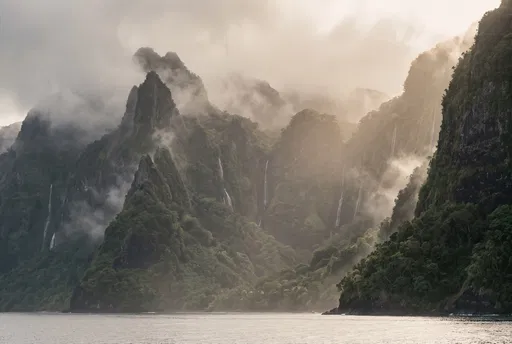 Misty Volcanic Island Peaks and Waterfalls