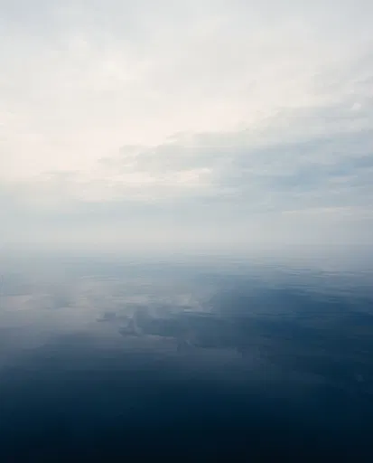 Calm Misty Ocean Horizon Reflection