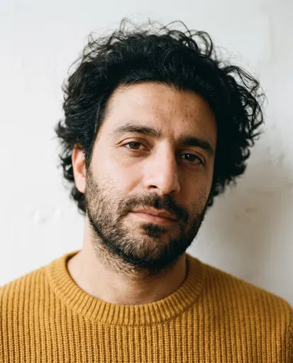Portrait of Man in Mustard Sweater