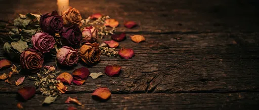 Dried Roses on Dark Weathered Wood