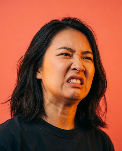 Woman Making Disgusted Facial Expression