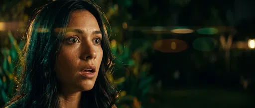 Surprised Young Woman at Night