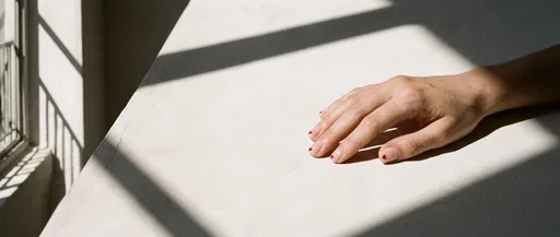 Hand With Minimal Red Heart Nail Art
