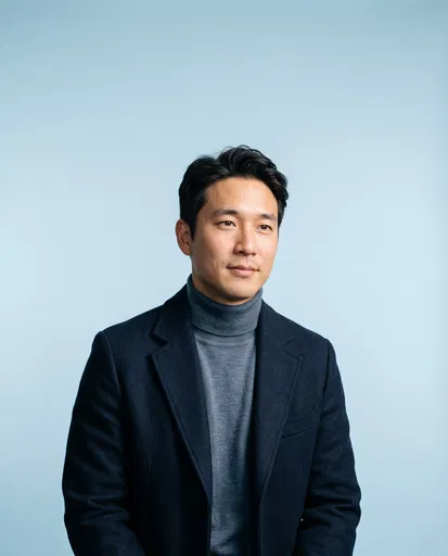 Studio Portrait of Man in Navy Coat