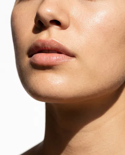 Macro Close-Up of Woman's Lips and Skin